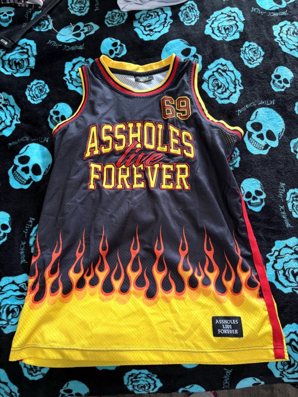 Black Mesh Jersey with Yellow Trim and Teal Graphic